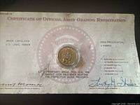 Front view of the sealed coin packaging showing the coin featuring President Monroe and certification details.