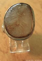 Top view of vintage sterling silver druzy stone ring showing natural crystal formation on the stone surface inside silver bezel.