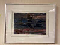 Frontal view of signed 3D glass art featuring bird silhouettes in a metal frame.