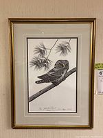 Front view of framed John Paul Lavand print, double matted, featuring owl perched on branch with pine needles