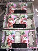 Three boxed fine bone china mugs by Mayfair & Jackson, floral pattern with pink flowers and green leaves.