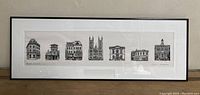 Full view of framed print showing seven architectural landmarks of Guelph in black and white line illustration.