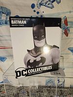 Boxed Batman DC Collectibles Black & White statue with Amanda Conner design shown from front with clear branding and stylized image of Batman.