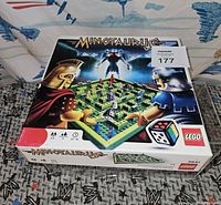 Box of Lego 3841 Minotaurus with colorful front art showing Lego warriors and Minotaur character.