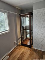 Full view of display case in room