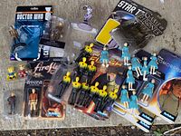 Overview of loose and carded action figures from various franchises.