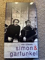 Front of the boxed set featuring black and white image of Simon & Garfunkel with title "old friends simon & garfunkel".
