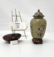 Photo showing the cloisonné vase on wooden stand and dish together, highlighting size and style.