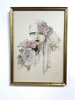 Full view of framed Sarah Moon Fortune Teller embroidery art showing the stylized woman and flowers