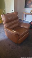 Front-side view of recliner chair in upright position