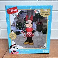 Box front showing Disney Minnie Mouse Christmas inflatable image, 3.5 feet tall, LED lights, brand new in box.