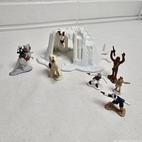 The full Ice Planet Hoth Wampa Cave playset with all included die cast figures arranged around it