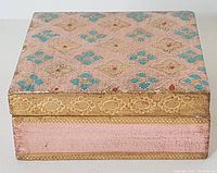 Top and front view of vintage Florentine keepsake box showing ornate hand-painted floral and gold patterns with pink and blue details.