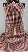 Full frontal photo of the red and white gingham apron on a mannequin showing overall shape and front pockets.