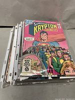 Stack of assorted comic books with 'Superman Krypton Chronicles' on top