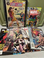 Lot of comics including Lois Lane #110 15 cent issue in a protective presentation case and assorted Marvel Heroes, Spider-Man, and Superman comics.