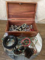 Open Lane wood jewelry box with assorted vintage and contemporary jewelry inside
