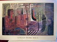 Close-up photo of the art print showing the abstract, colorful geometric and organic shapes with textured brush stroke details and the printed name Adrian Wong Shue.