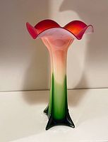 Front view of the vintage Murano large art glass vase showing the tulip shape and color gradient from green base to pink and red rim.