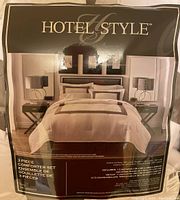 Package view of the King size Hotel Style 3 piece comforter set showing branding and product image.