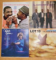 Four vintage jazz and guitar instrumental LPs showing cover art of Jimmy Smith & Wes Montgomery, The Montgomery Brothers, Hank Garland, and Charlie Byrd albums.