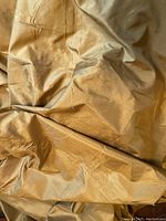 Close-up of folded fabric showing color and texture