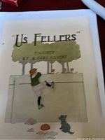 Front cover page of the Us Fellers booklet showing a child climbing a wall with a dog watching.