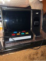 Front view showing the black display screen and colored control buttons including START, DOUBLE-UP, BIG, SMALL, PLAY CREDIT.
