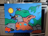 Full view of painting on kitchen counter showing overall composition