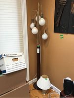 Full view of floor lamp and table lamp side by side