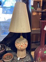 Full view of ceramic table lamp with hemp lampshade, showing overall appearance and size proportion.