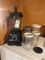 Full lot: blender base with installed jar, secondary container, three cups