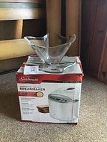 Sunbeam bread maker in original box with glass platter and glass bowl on top
