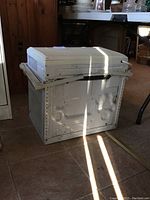 Three side views of the LG LW8000CS air conditioner showing front control panel, power cord, and overall unit condition