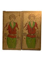 Front view of the closed wooden box showing the detailed pyrography design of the Gibson Girl golfer and the hinge between the two panels.