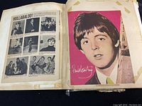 Open scrapbook spread showing a large color headshot of Paul McCartney with tape residue and a news article titled 'HULLABALOO!',' displaying black and white photographs of Beatles and others