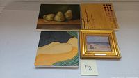 View of four oil paintings together including still life pears, abstract color swatches, abstract dunes and waves, and framed beachscape.