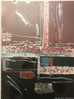 Close-up of abstract design elements with maroon, black, white, blue and rust colors and textured areas