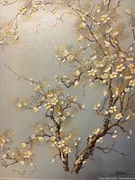 Close-up of painted blooming branches and artist signature showing detail of flowers and paint texture.