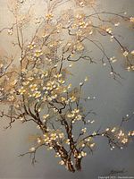 Close-up of floral branch with white and yellow blossoms on muted blue background, showing artist signature Roland.