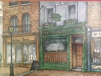 Close-up view of the lithograph showing detailed storefronts including 'Davy Byrne's' and 'Michael Bane'.
