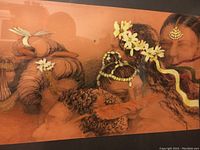 Close-up photo showing details of the heads and floral decorations in the artwork, including texture and medium used