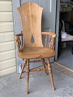Full front view of solid oak high-back hall chair