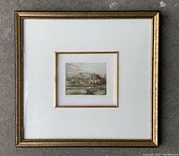 Framed print showing entire artwork, matting and gold-tone frame