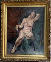 Front view of seated woman in pink slip within gilt frame