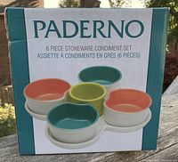 Front of the box showing the Paderno branding and a picture of the 6 piece stoneware condiment set with mixed color bowls.