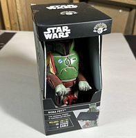 Boxed Boba Fett Cable Guy figurine in original unopened packaging showing figure and USB cable included