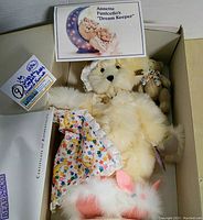 Annette Funicello Dream Keeper Bear in original box with Certificate of Authenticity and star pendant visible.