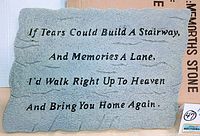 Grey resin memory stone with engraved 'Stairway to Heaven' poem visible.