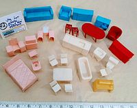 Full lot overview showing all furniture pieces laid out including bedroom, living room, kitchen, dining, and bathroom items in assorted colors.